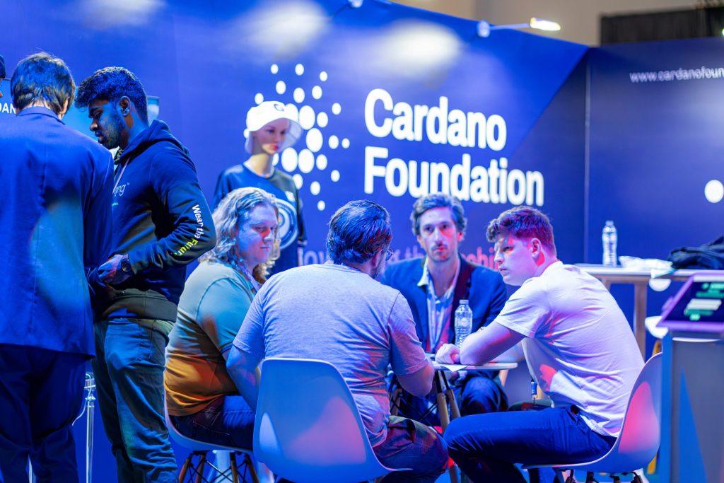 meeting at Cardano Summit 2023 booth