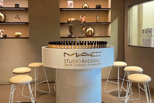 MAC Studio Radiance Serum Powdered Foundation podium at MACxGanache event